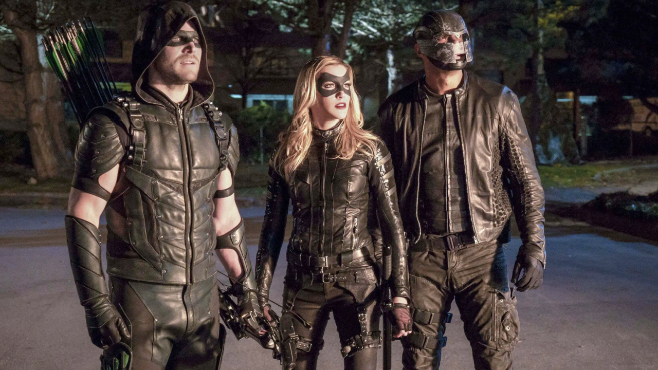 (L to R) Stephen Amell, Katie Cassidy, and David Ramsey in 'Arrow'. Photo: Warner Bros. Television.