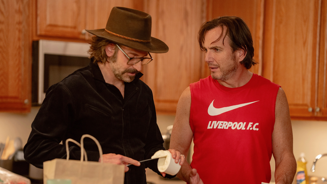 (L to R) Bradley Cooper and Will Arnett star in 'Is This Thing On?' Photo by Searchlight Pictures/Jason McDonald/ Courtesy of Searchlight Pictures. © 2025 Searchlight Pictures All Rights Reserved.