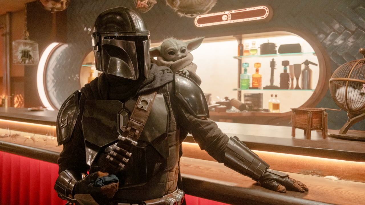 (L to R) Mandalorian (Pedro Pascal) and Grogu in Lucasfilm's THE Mandalorian and Grogu'. Photo by Nicola Goode. © 2025 Lucasfilm Ltd™. All Rights Reserved.