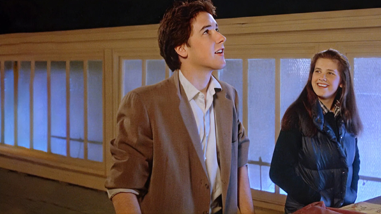 (L to R) John Cusack and Daphne Zuniga in 'The Sure Thing'. Photo: Embassy Films Associates.