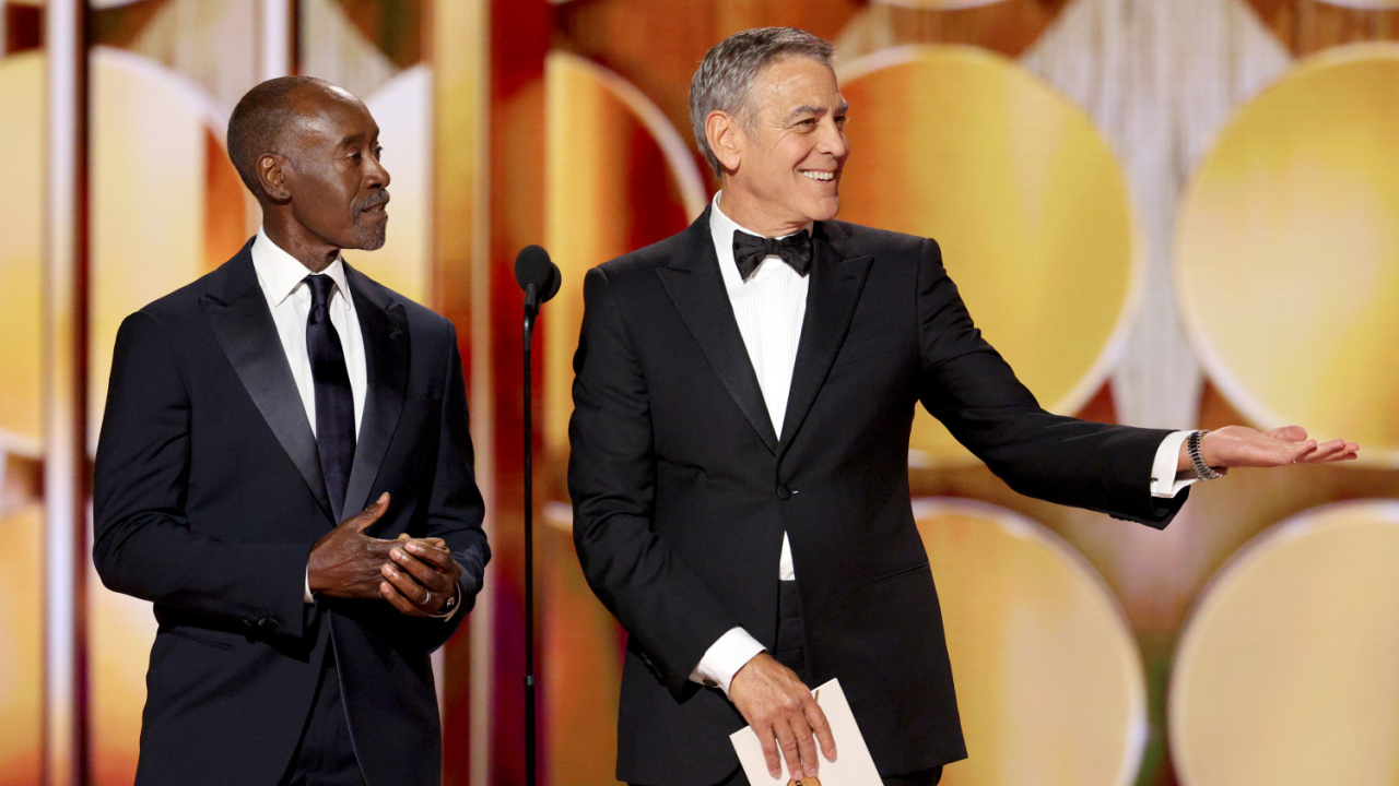 (L to R) Don Cheadle and George Clooney speak onstage during the 83rd Annual Golden Globes®, airing live from the Beverly Hilton in Beverly Hills, California on Sunday, January 11, 2026 at 8 PM ET/5 PM PT, on CBS and streaming on Paramount+. Photo: Kevork Djansezian/CBS ©2026 CBS Broadcasting, Inc. All Rights Reserved.