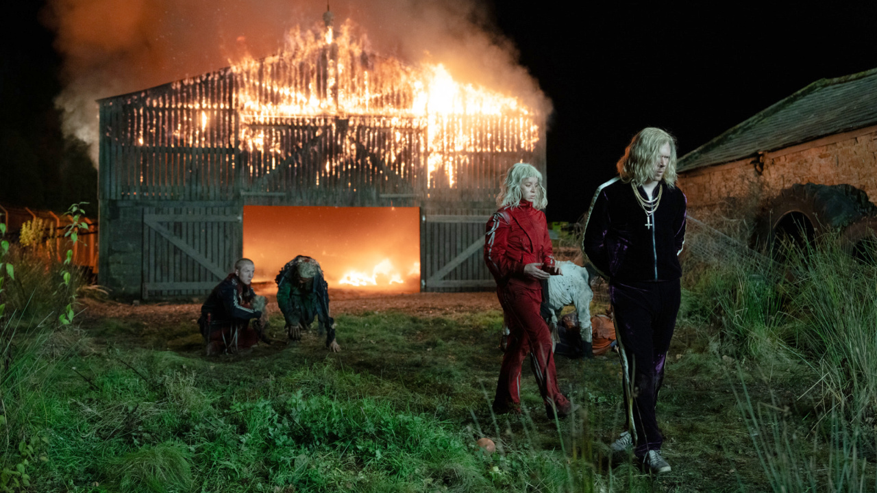 (L to R) Jimmy Ink (Erin Kellyman) and Sir Jimmy Crystal (Jack O'Connell) with the Jimmies in Columbia Pictures' '28 Years Later: The Bone Temple'. Photo: Miya Mizuno. © 2025 CTMG, Inc. All Rights Reserved.