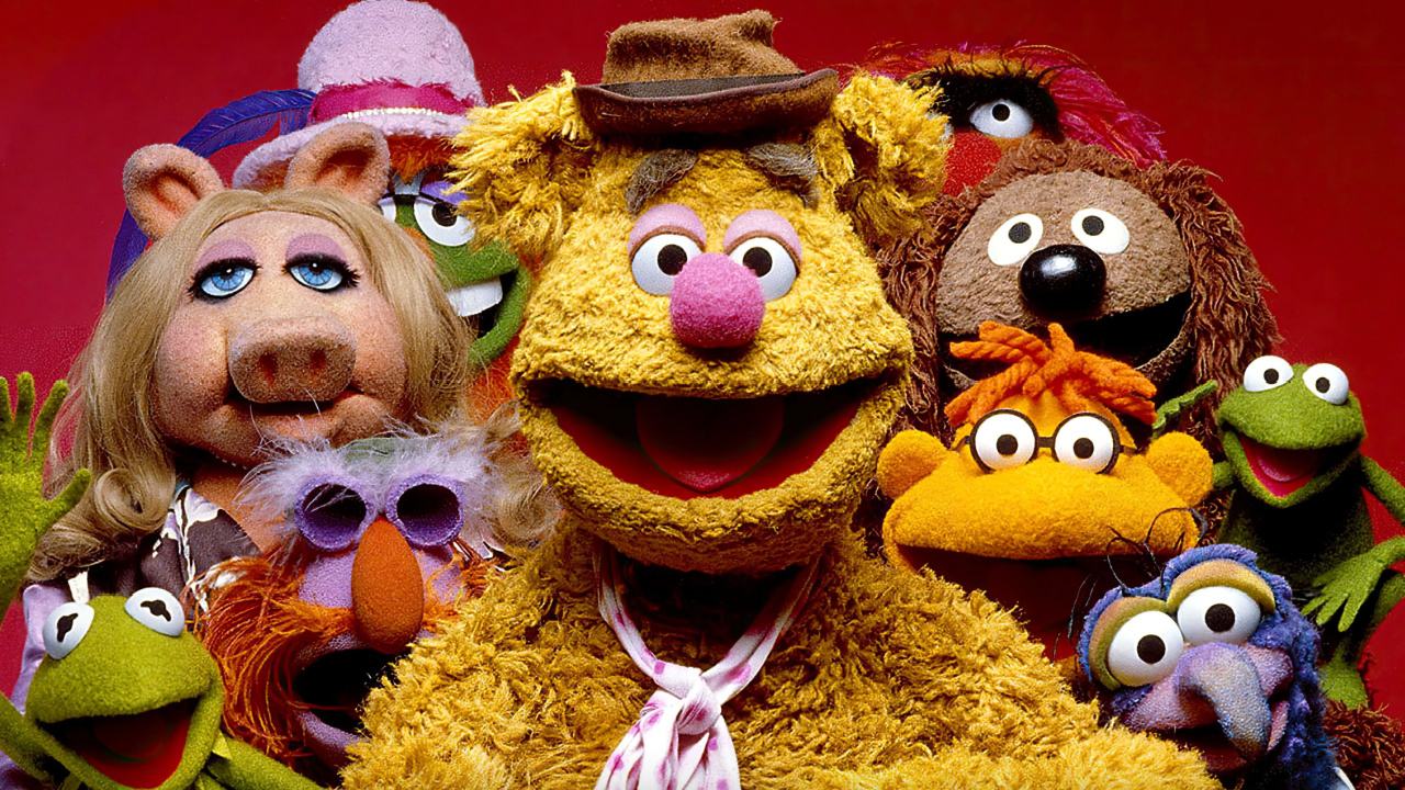(L to R) Kermit The Frog, Floyd Pepper, Miss Piggy, Dr. Teeth, Fozzie Bear, Animal, Rowlf the Dog, Scooter, Robin The Frog, and Gonzo The Great on 'The Muppet Show'. Photo: Henson Associates.