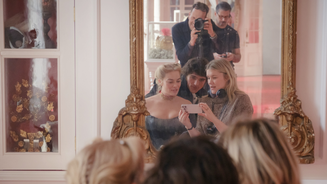 (L to R) Actor, Producer Margot Robbie, Jacob Elordi and Director, Writer, Producer Emerald Fennell on the set of 'Wuthering Heights', a Warner Bros. Pictures Release. Photo Credit: Photo by Jaap Buitendijk. Copyright: © 2026 Warner Bros. Ent. All Rights Reserved.