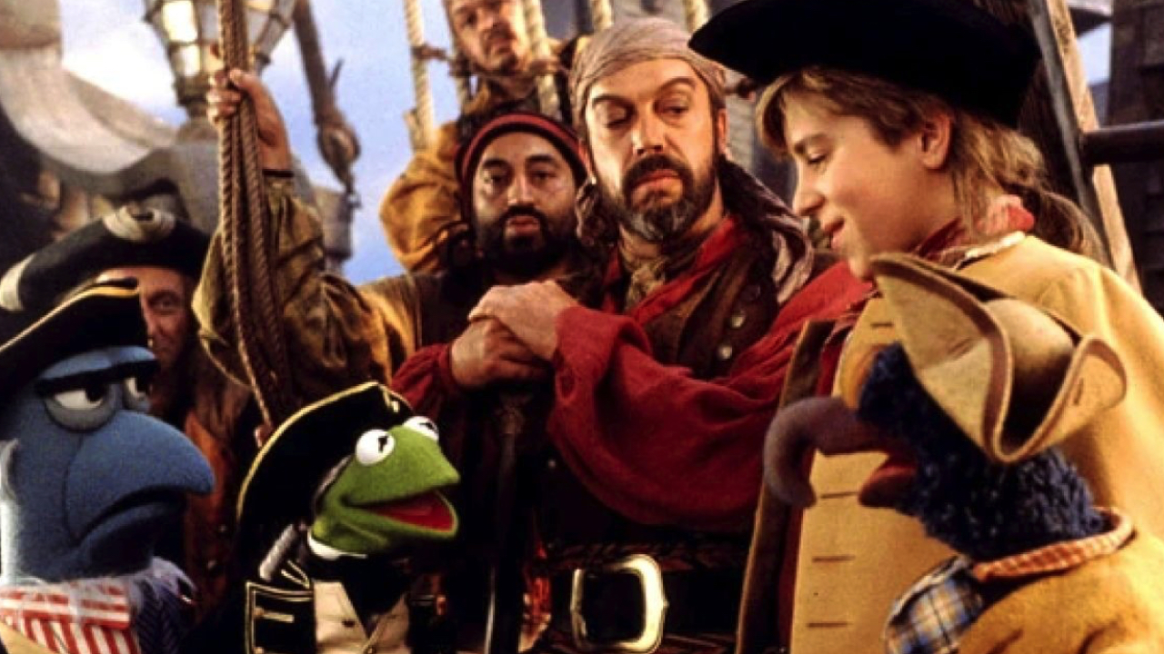 (L to R) Sam the Eagle, Kermit the Frog, Tim Curry, Kevin Bishop, and Gonzo in 1996's 'Muppet Treasure Island.' Photo courtesy of Disney. 