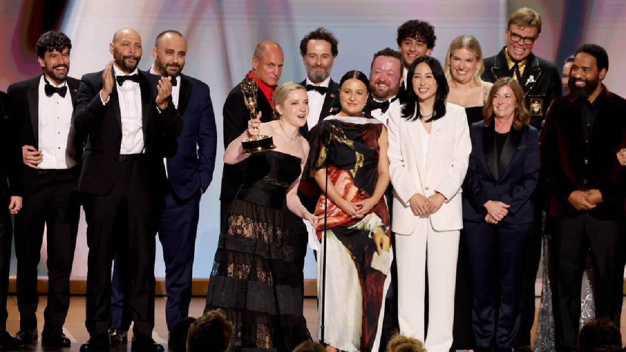 (L to R) Cast and crew including Colton Dunn, presenter Woody Harrelson, Katie Dippold, Matthew Rhys, Carver Karaszewski, Neil Casey, Kingston Rumi Southwick, Jeff Hiller and Kevin Carroll, accept the Outstanding Comedy Series Award for 'Widow's Bay' on stage during the 78th Primetime Emmy Awards held at the Peacock Theater on September 14, 2026. Photo: Trae Patton/NBC.