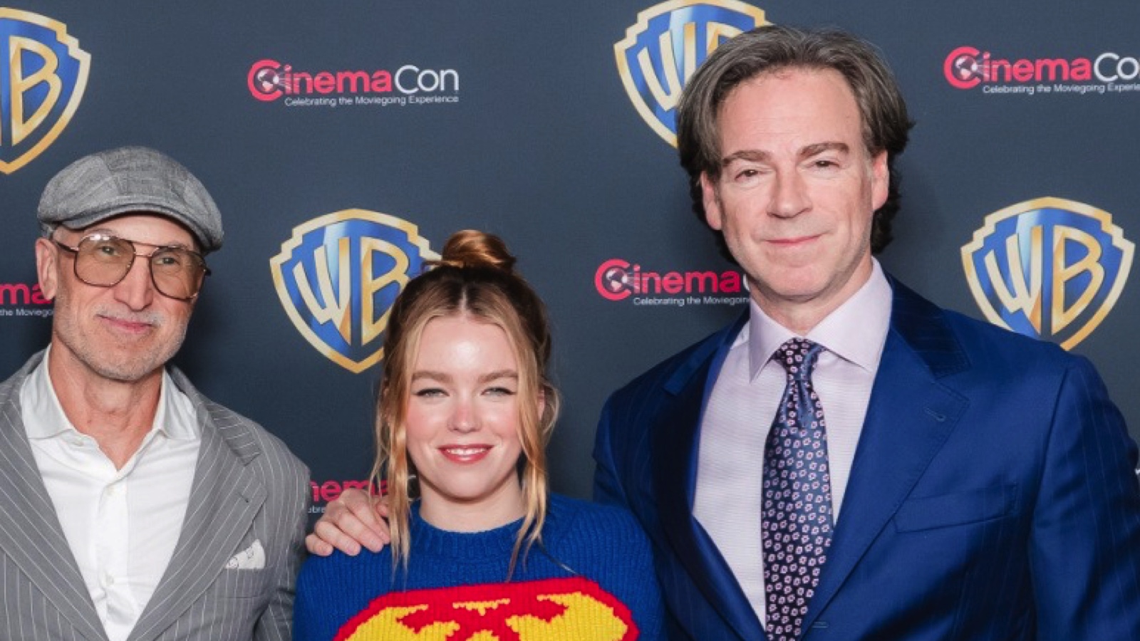 (L to R) Director Craig Gillespie, Milly Alcock, and producer Peter Safran for 'Supergirl' at CinemaCon 2026. Photo Credit: David Jon @davidjonphotography. 