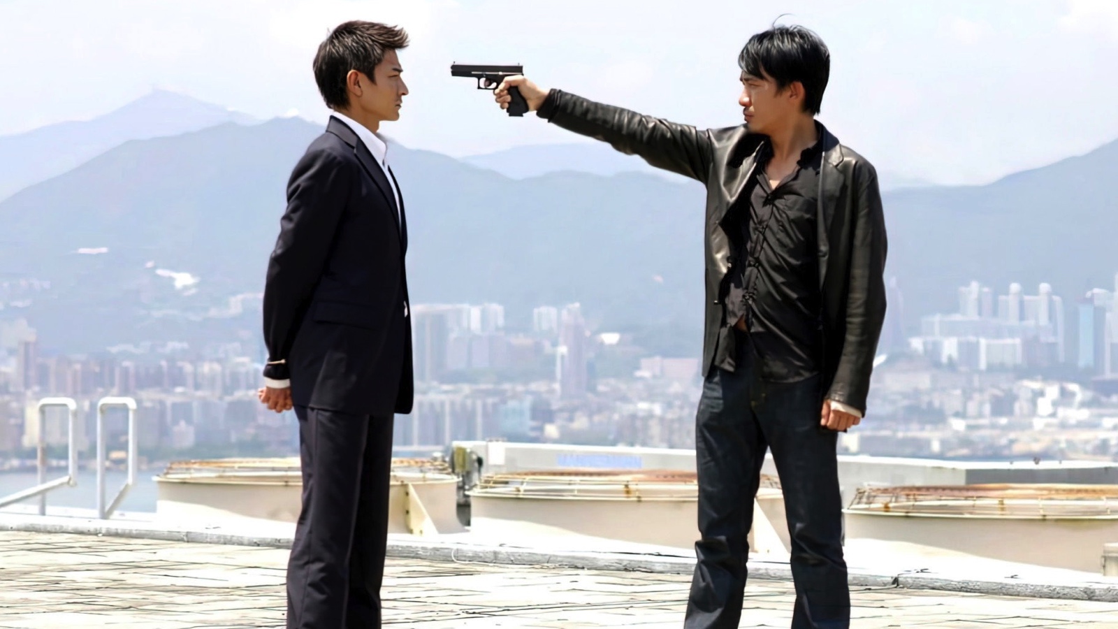 (L to R) Andy Lau and Tony Leung Chiu-wai in ‘Infernal Affairs.’ Photo: Miramax.