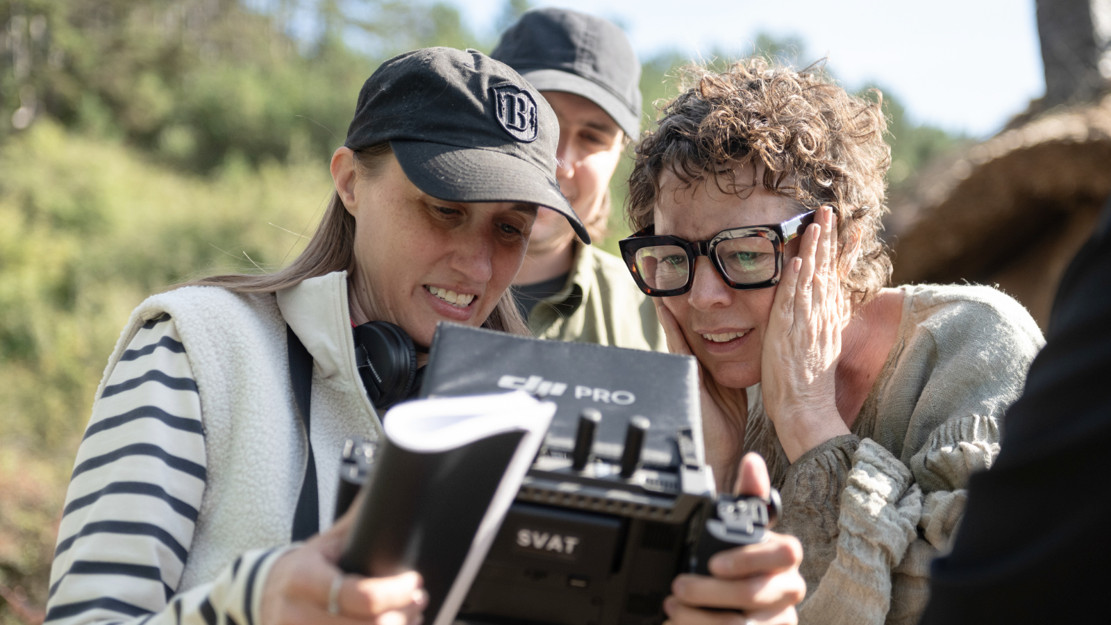(L to R) Directors Eleanor Wilson and Alex Huston Fischer, and Olivia Colman on the set of 'Wicker' by Eleanor Wilson and Alex Huston Fischer, an official selection of the 2026 Sundance Film Festival. Courtesy of Sundance Institute. Photo: Lol Crawley.